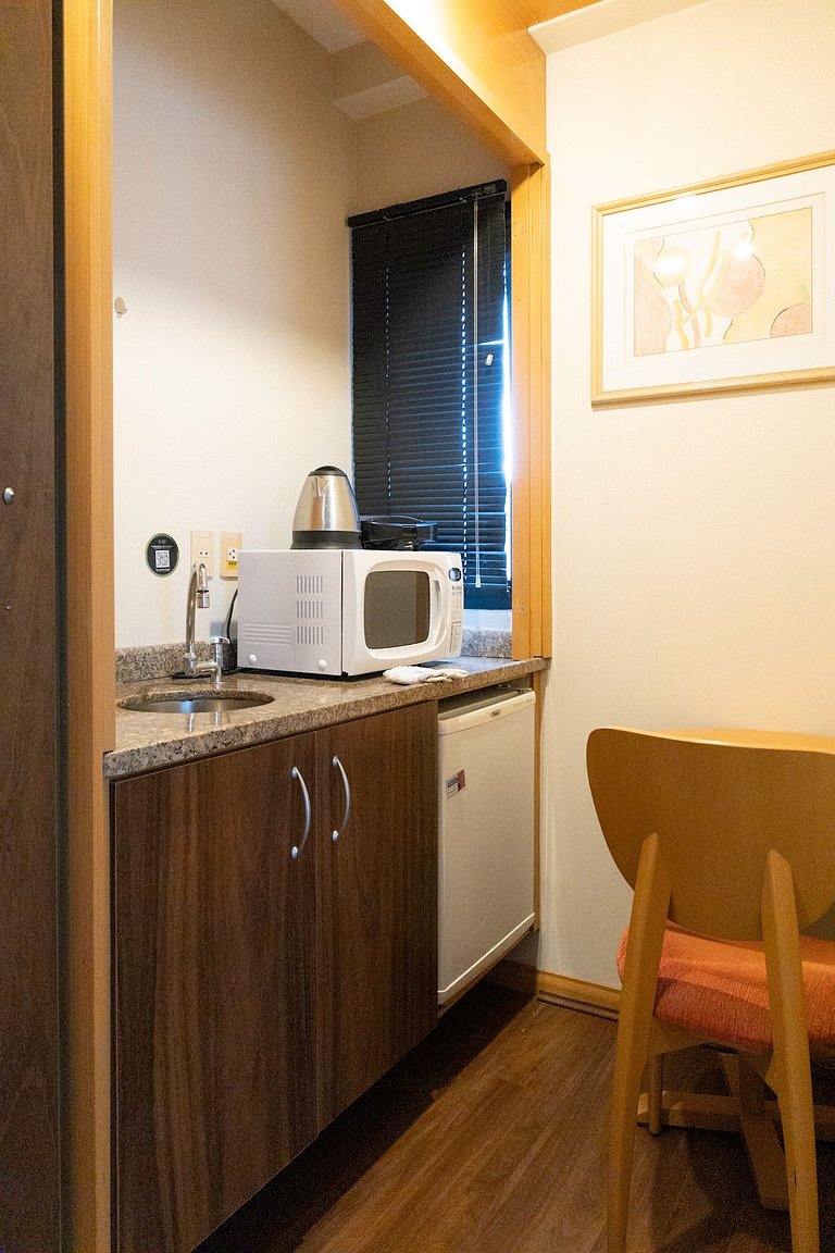 Ótimo Flat com ótima localização, condicionado e garagem
