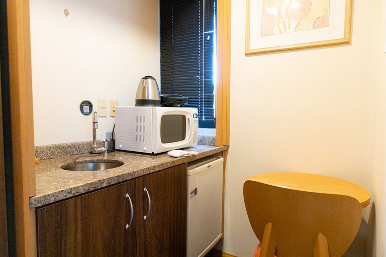 Ótimo Flat com ótima localização, condicionado e garagem
